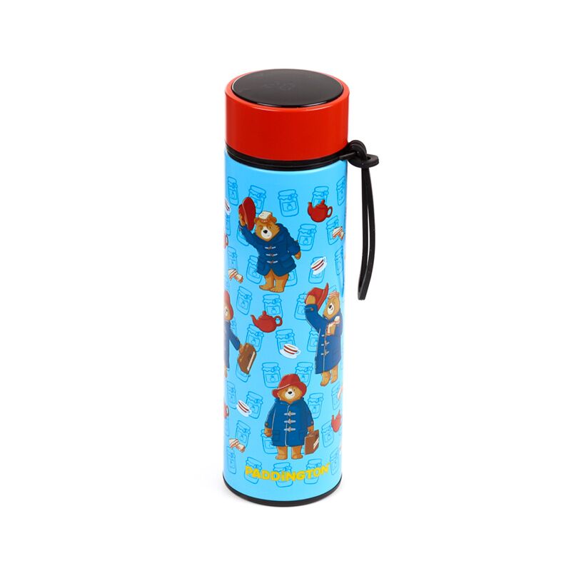 Paddington Bear reusable insulated drinks bottle with red lid, blue patterned body and black strap.