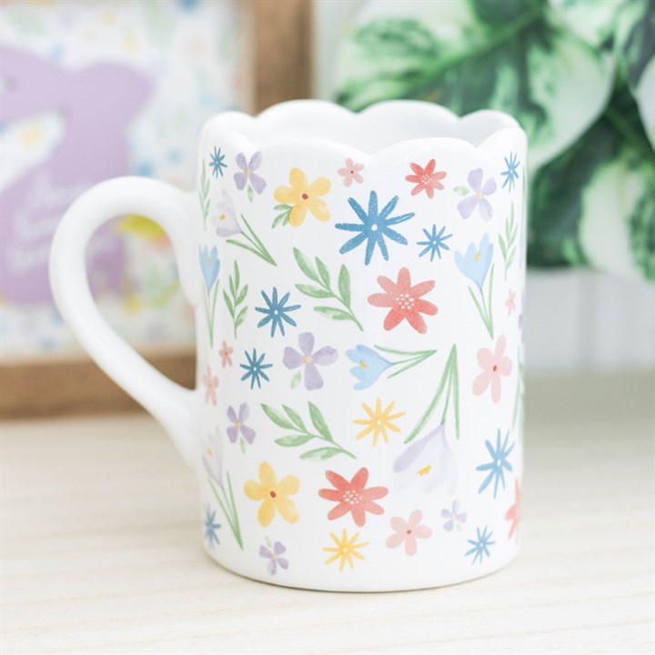 Delight in the Spring Floral Print Scalloped Mug, featuring pastel flowers and a charming scalloped rim. Perfect for tea!