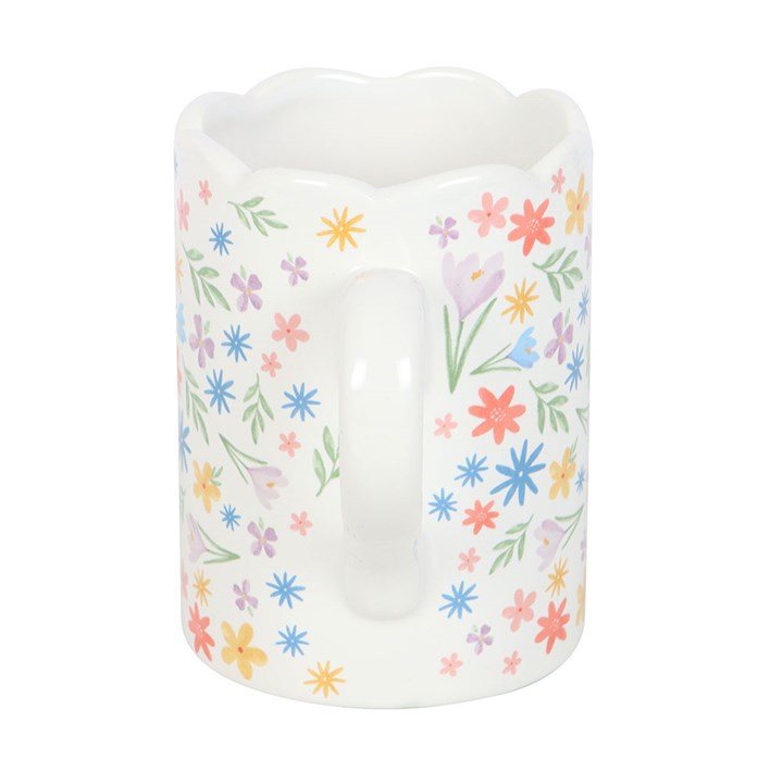Delight in the Spring Floral Print Scalloped Mug, featuring delicate pastel flowers and a charming scalloped rim.