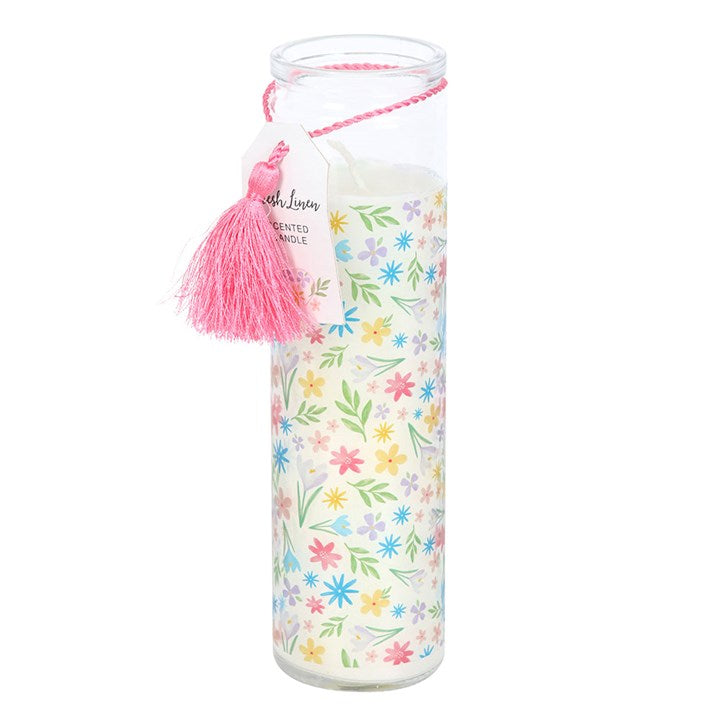 Spring Floral Print Fresh Linen Tube Candle with pastel floral wrap and pink tassel.