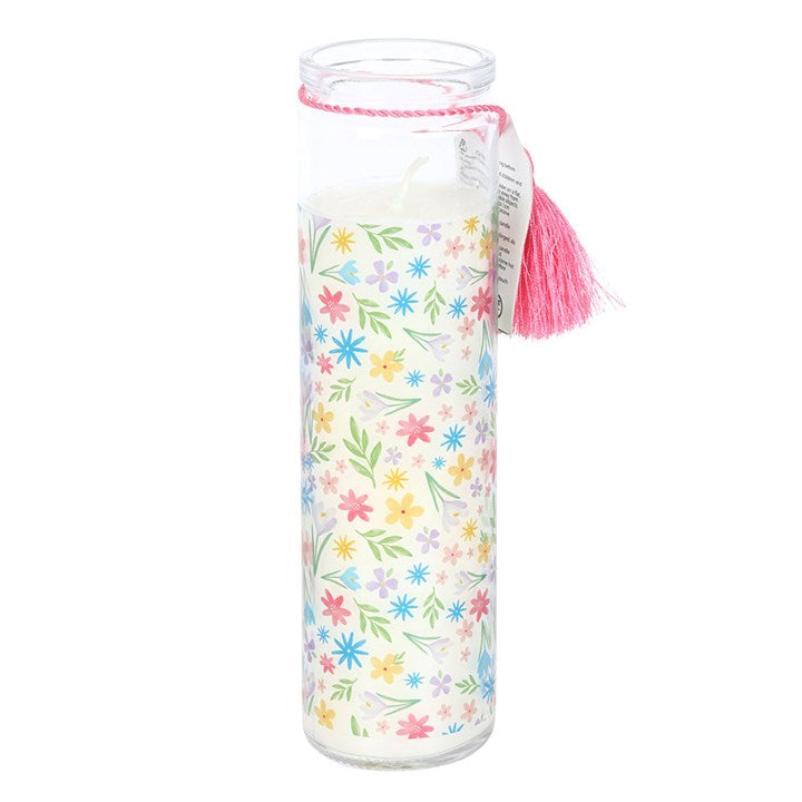 Spring Floral Print Fresh Linen Tube Candle in a tall clear glass jar with colourful flowers and pink tassel.