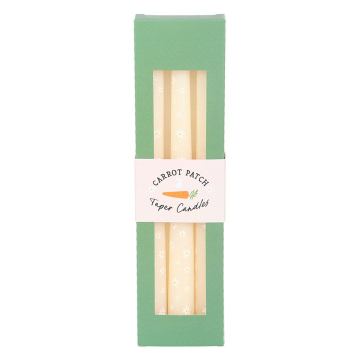 Set of 3 Carrot Patch Daisy Taper Candles unscented, perfect for adding a spring touch to any table or decor.