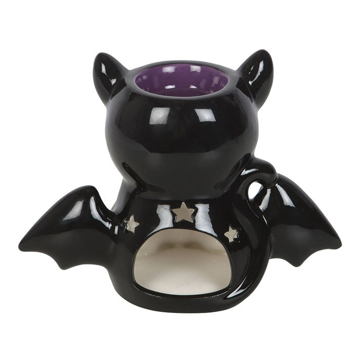 Black bat-winged cat oil burner with purple interior and star accents.