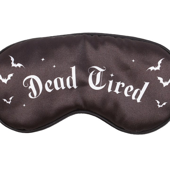 Dead Tired Satin Sleep Mask offers gothic charm while blocking light for a restful night's sleep. Perfect for beauty sleep.