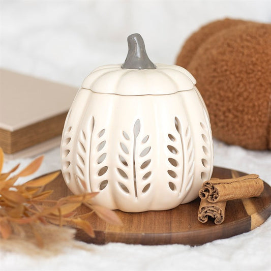 Cream Leaf Cut Out Pumpkin Oil Burner and Wax Warmer adds autumn elegance with its charming design and cosy atmosphere.