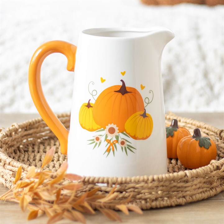 Autumn Pumpkin Ceramic Flower Jug with vibrant orange handle, perfect for seasonal decor and floral arrangements.