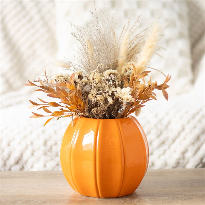 Brighten your home this autumn with the Orange Pumpkin Vase, perfect for seasonal decor or fresh flowers.