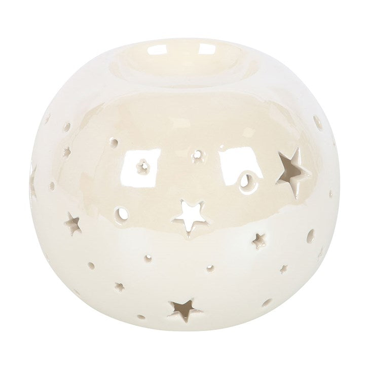 White Iridescent Star Oil Burner and Wax Warmer, spherical ceramic with star-shaped cut-outs casting a starry glow.