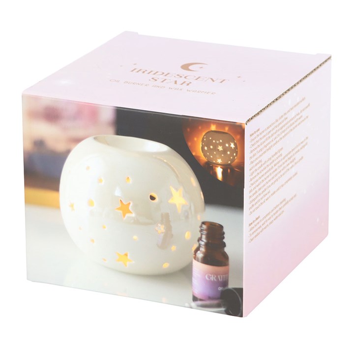 White Iridescent Star Oil Burner and Wax Warmer in pink box with star-cut ceramic design.