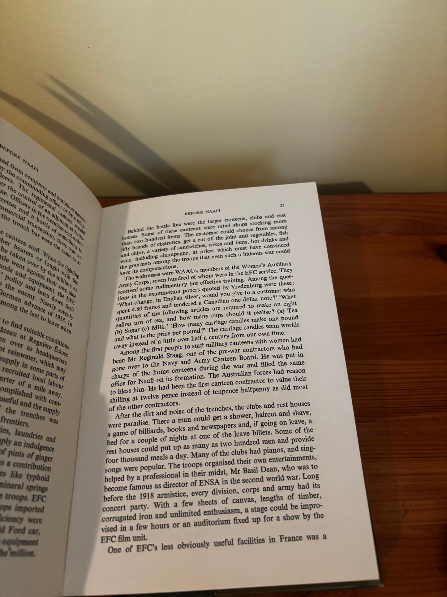 Inside view of "Service to the services: The story of Naafi Hardcover – 1 Jan. 1971," showcasing historical content.
