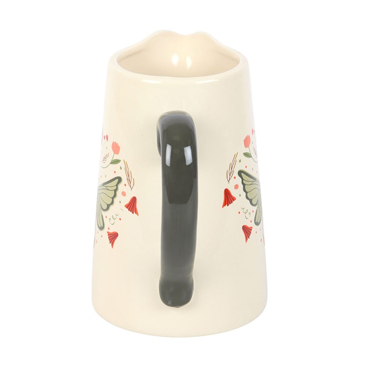 Whimsical Fairy Wing Ceramic Flower Jug designed for vibrant blooms, perfect for dining tables or windowsills.