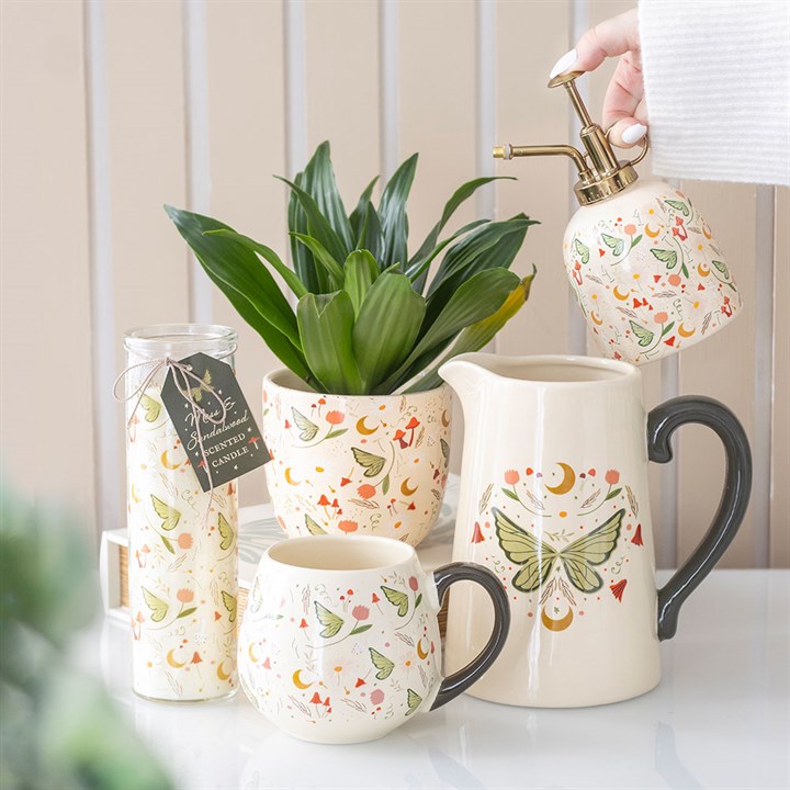 Whimsical Fairy Wing Ceramic Flower Jug, perfect for garden blooms and brightening any space at home.
