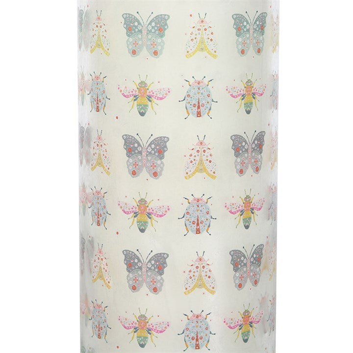 Floral Bug Garden Rose Tube Candle with pastel butterfly and insect patterns.