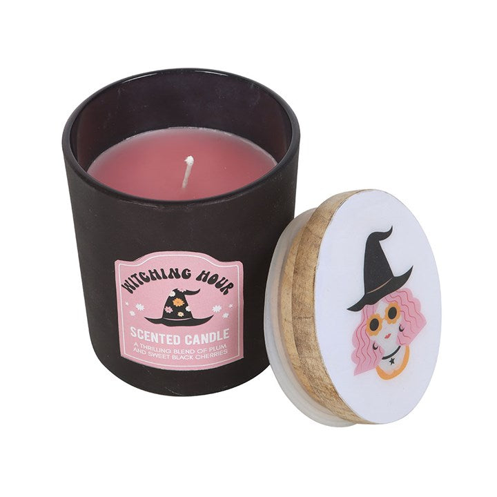 Witching Hour Plum and Black Cherry Candle in a glass holder, perfect for enchanting, cosy evenings.