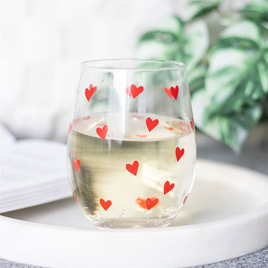 Heart Print Stemless Glass with vibrant red hearts, perfect for romantic cocktails and joyful moments at home.