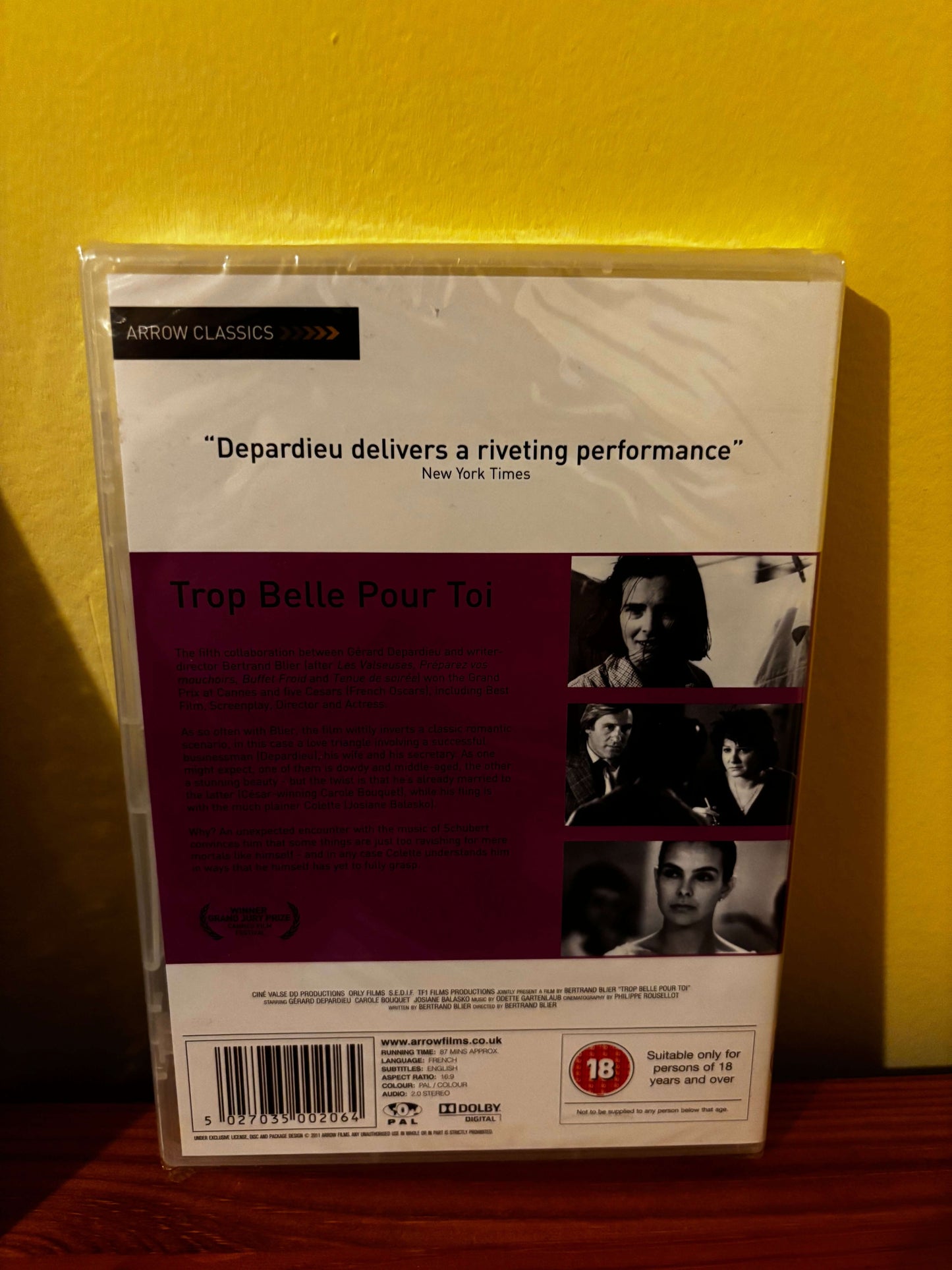 Back cover of Trop Belle Pour Toi DVD starring Gérard Depardieu, 1989 Cannes Grand Prix winner; sealed, pink artwork.
