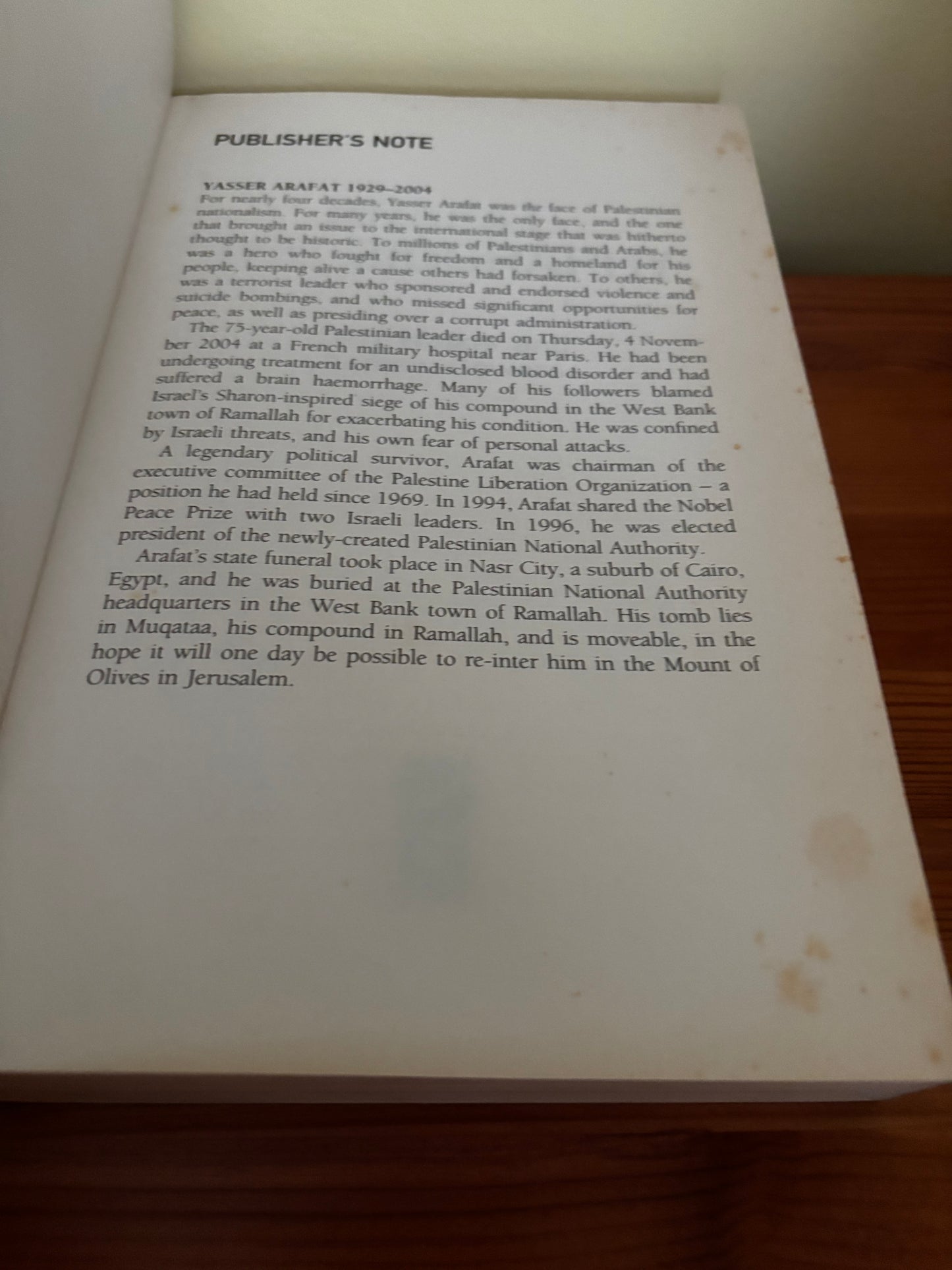 Publisher's note from "Arafat: The Biography By Tony Walker - Insightful Read," revealing Arafat's complex legacy.