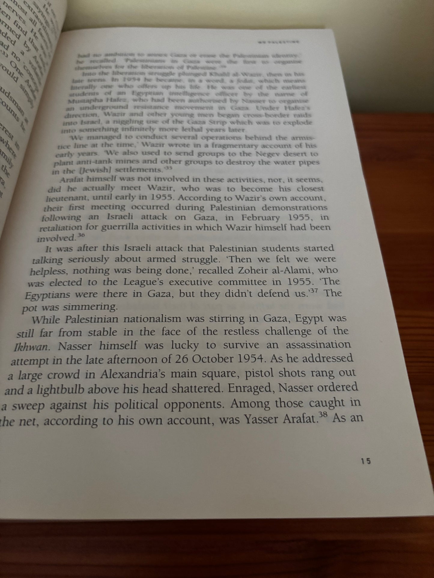 Text from "Arafat: The Biography By Tony Walker - Insightful Read" reveals Yasser Arafat's complex history and leadership.