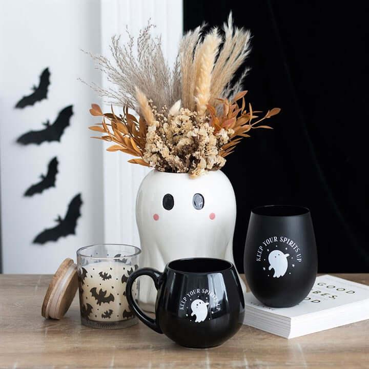 Sweet Ghost Flower Vase adds ghostly charm to autumn blooms and Halloween décor, perfect for any floral display.
