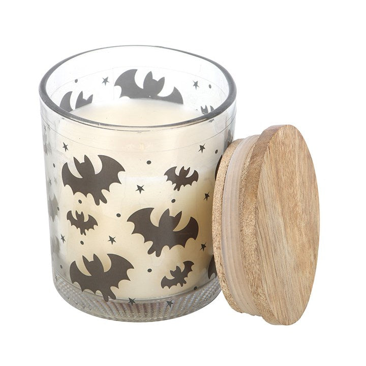 Bat Print Mulberry Candle in a clear glass jar with bat silhouettes and a wooden lid.