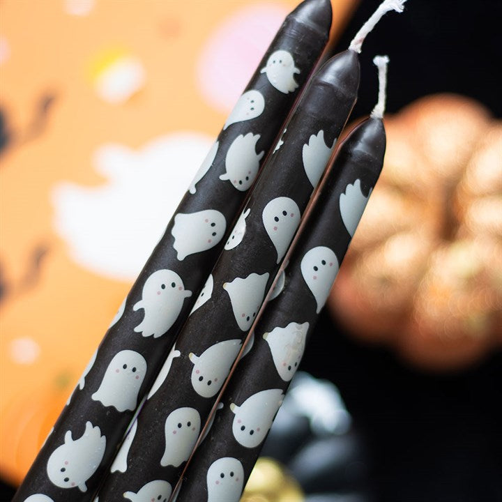 Set of 3 Ghost Print Taper Candles, perfect for spooky Halloween décor with playful ghost designs.