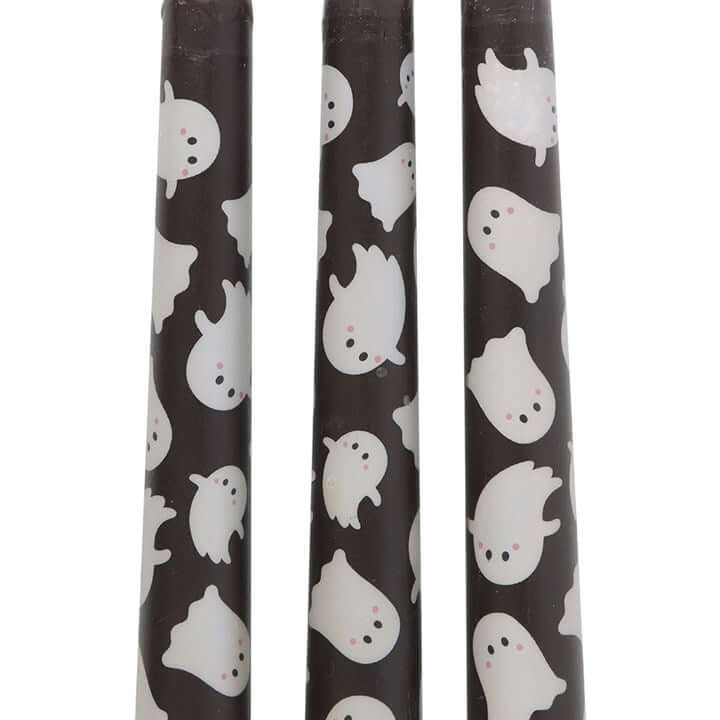 Set of 3 Ghost Print Taper Candles, featuring playful ghosts, perfect for festive Halloween décor and table settings.