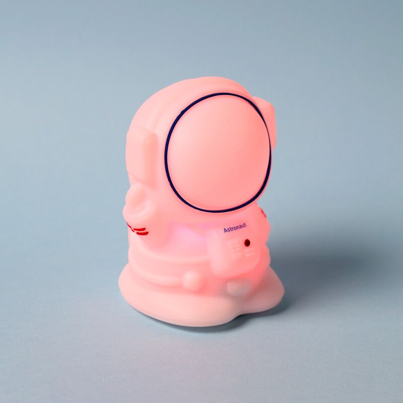 Colour-changing Space Cadets astronaut sleep lamp in silicone, USB-C rechargeable.