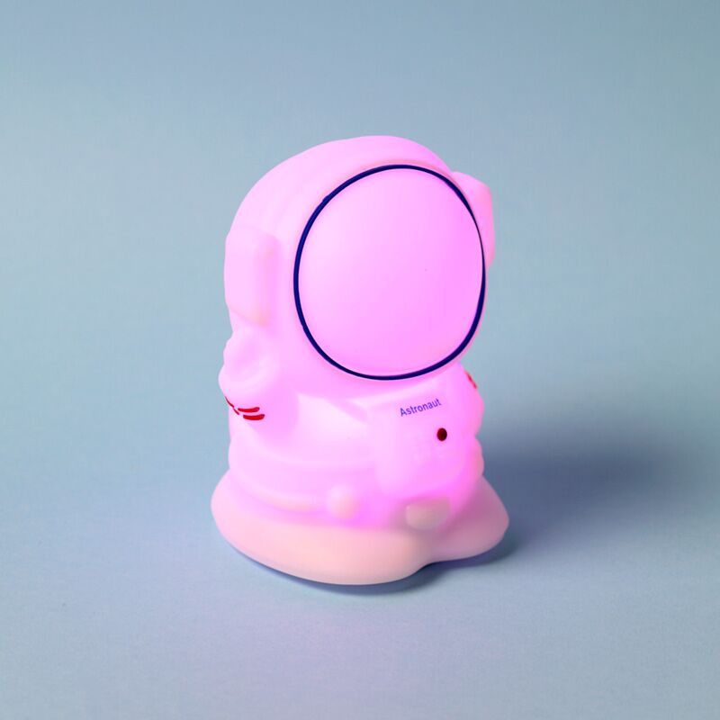 Space Cadets Astronaut colour-changing sleep lamp in pink silicone, USB-C rechargeable.
