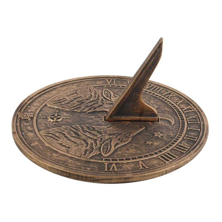 Howling Wolves Terracotta Sundial by Lisa Parker features a rustic finish, perfect for garden lovers.