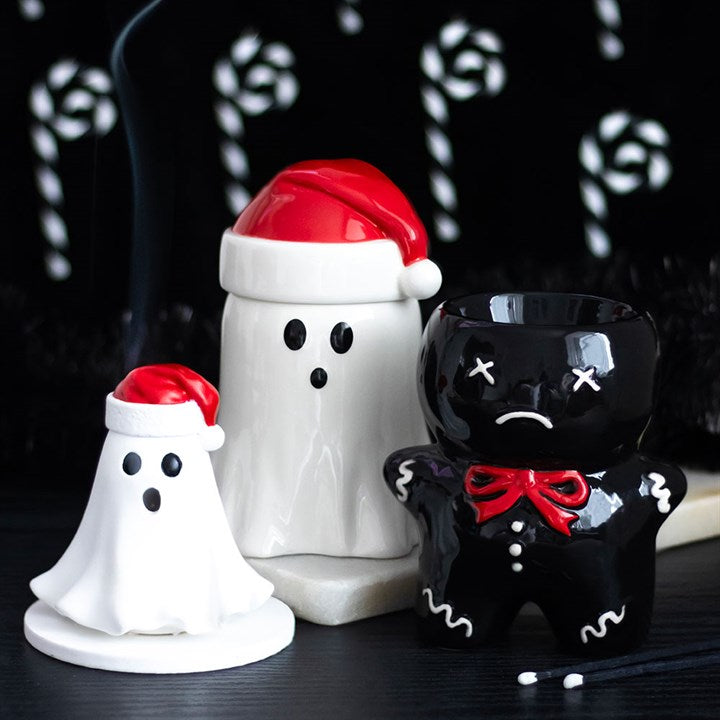 Charming Ghost with Santa Hat Oil Burner and Wax Warmer adds spooky flair to festive decor, perfect for Christmas.