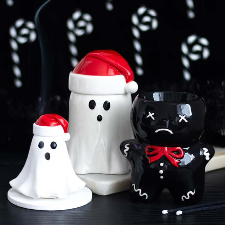 Charming Ghost with Santa Hat Oil Burner and Wax Warmer adds spooky flair to festive decor, perfect for Christmas.