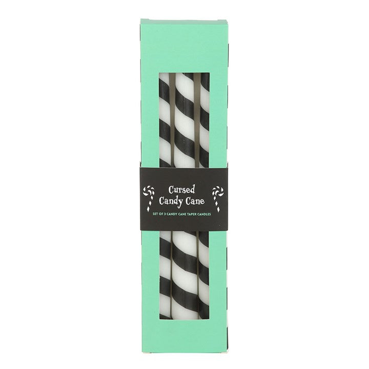 Set of 3 Black Candy Cane Taper Candles - Unscented, perfect for gothic festive decor and alternative Christmas themes.