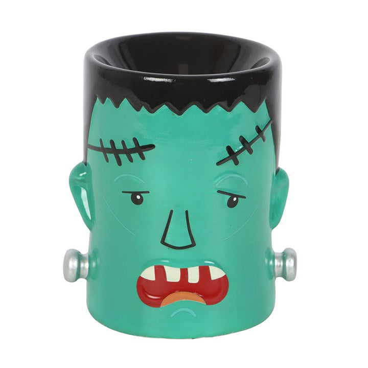 Grumpy Frank Monster Oil Burner and Wax Warmer adds a spooky glow and delightful scents to your Halloween decor.