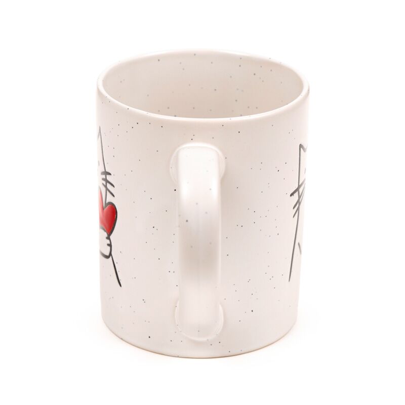 Stoneware mug featuring a cat holding a red heart on a speckled white glaze.