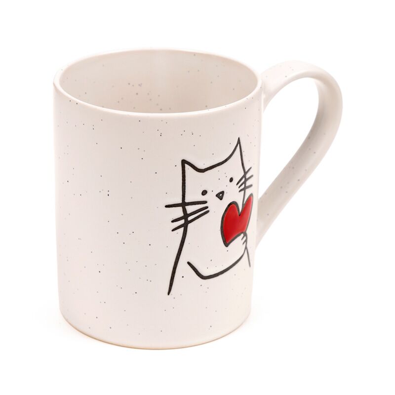 Stoneware mug featuring a line-drawn cat holding a red heart on a speckled white glaze.