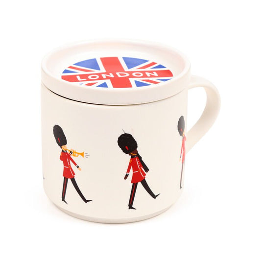 Porcelain mug with Union Jack lid featuring London Guardsman cartoon design