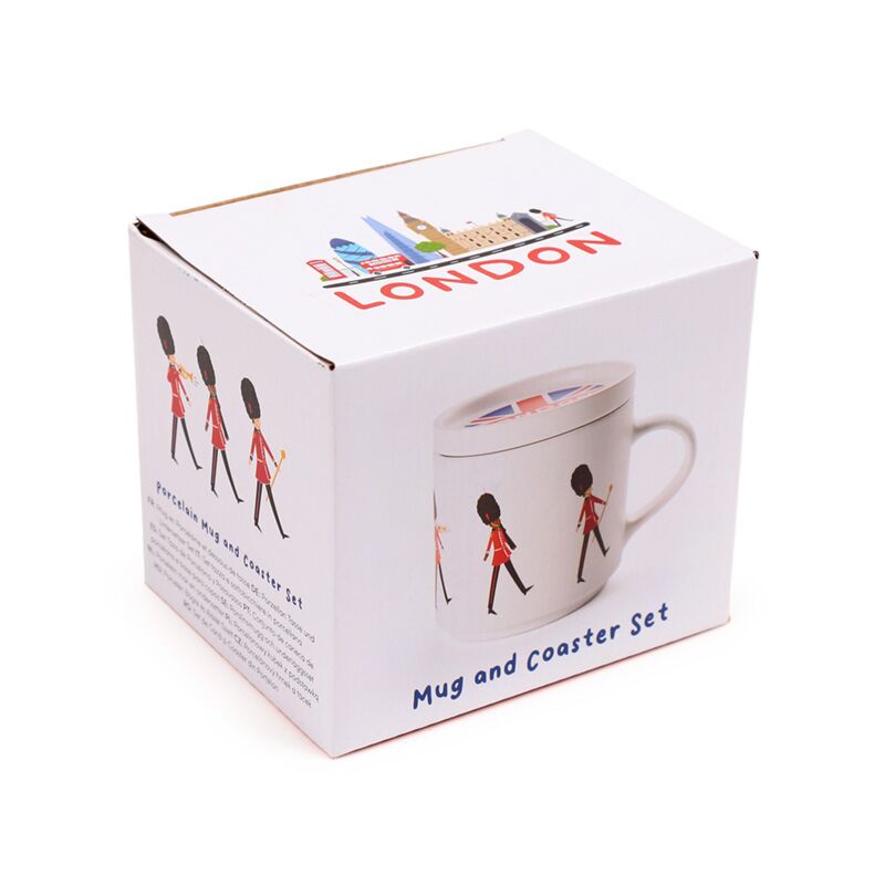 London Guardsman porcelain mug and coaster lid set, a boxed London souvenir.