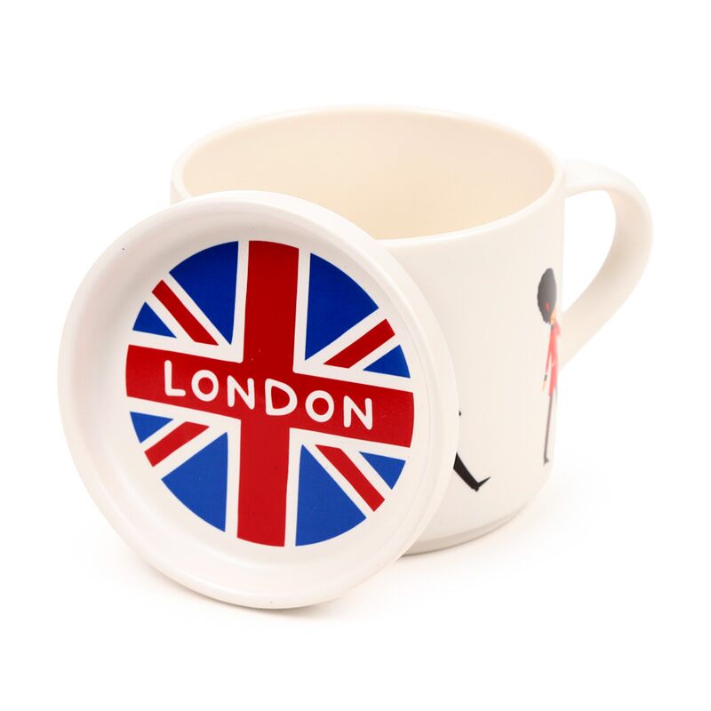 Porcelain mug and coaster lid set featuring London Guardsman motif; lid shows London flag design.