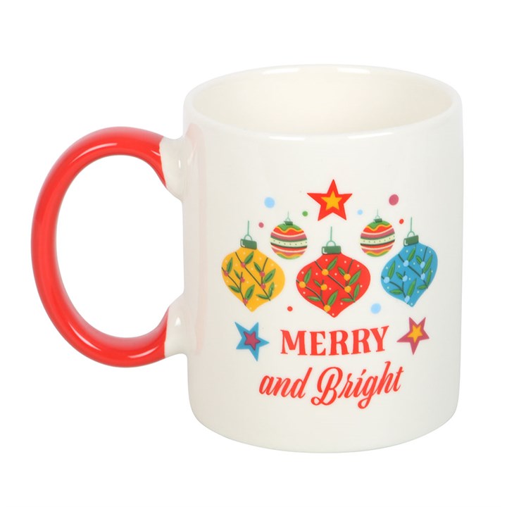 Brighten your festive moments with the Merry and Bright Bauble Mug, featuring a cheerful design and red handle.