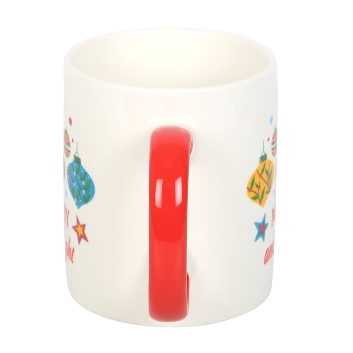 Brighten your winter mornings with the Merry and Bright Bauble Mug, featuring a festive design and red handle.