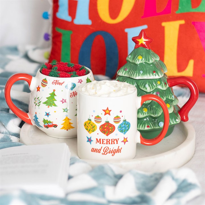 Festive Merry and Bright Bauble Mug on display, perfect for cosy winter drinks and holiday cheer.