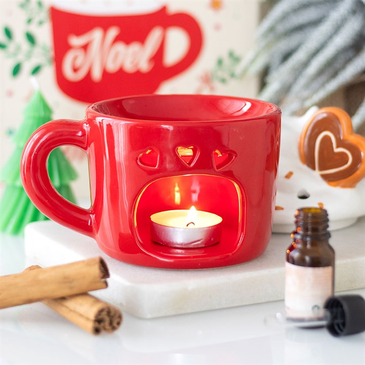 Hot Chocolate Mug Shaped Oil Burner by Cosy Winter, red ceramic mug with lit candle and festive fragrance vibe.