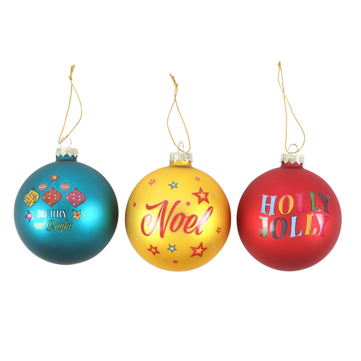 Set of 3 Nostalgic Christmas Glass Baubles in vibrant colours with festive designs: 'Holly Jolly', 'Noel', and 'Merry and Bright'.