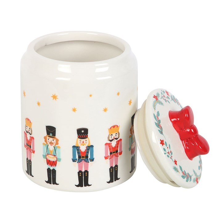 Festively designed, the Nutcracker Storage Jar with Bow is perfect for storing treats in style.