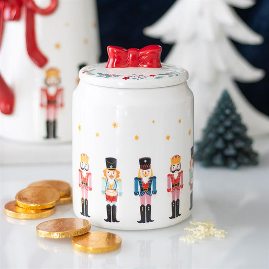 Festive Nutcracker Storage Jar with Bow, ideal for storing treats, adding charm to your kitchen décor.