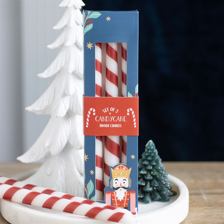 Set of 3 Candy Cane Stripe Taper Candles bring festive charm to your home this Christmas. Perfect for any seasonal display.