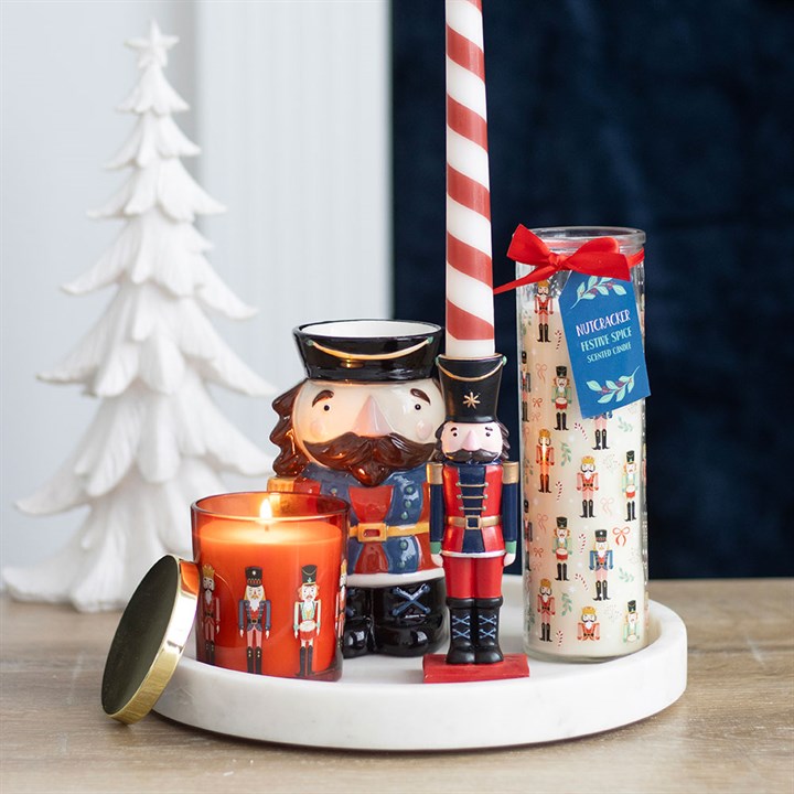 Celebrate Christmas with the Nutcracker Taper Candle Holder, adding traditional charm to your festive decor.