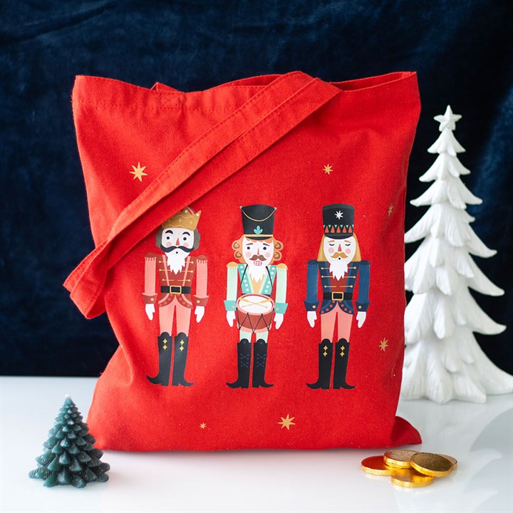 Festively carry your items with the Nutcracker Print Polycotton Tote Bag, featuring a charming nutcracker design.