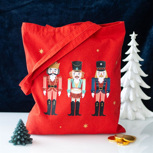 Festively carry your items with the Nutcracker Print Polycotton Tote Bag, featuring a charming nutcracker design.