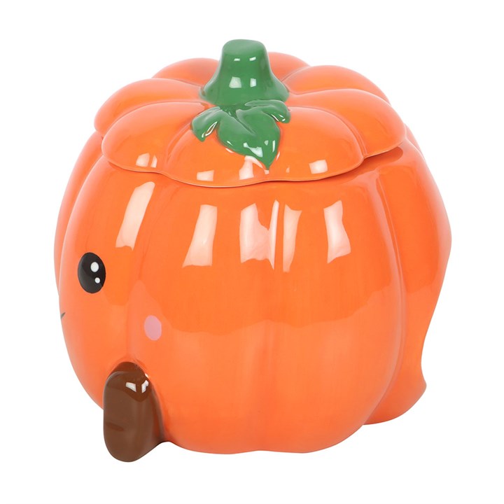 Cute smiling ceramic pumpkin oil burner and wax warmer with removable lid for cosy autumn fragrances.